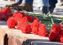 Baku residents bringing flowers to Seaside Boulevard to honor missing oil workers.  Azerbaijan, Dec.07, 2015